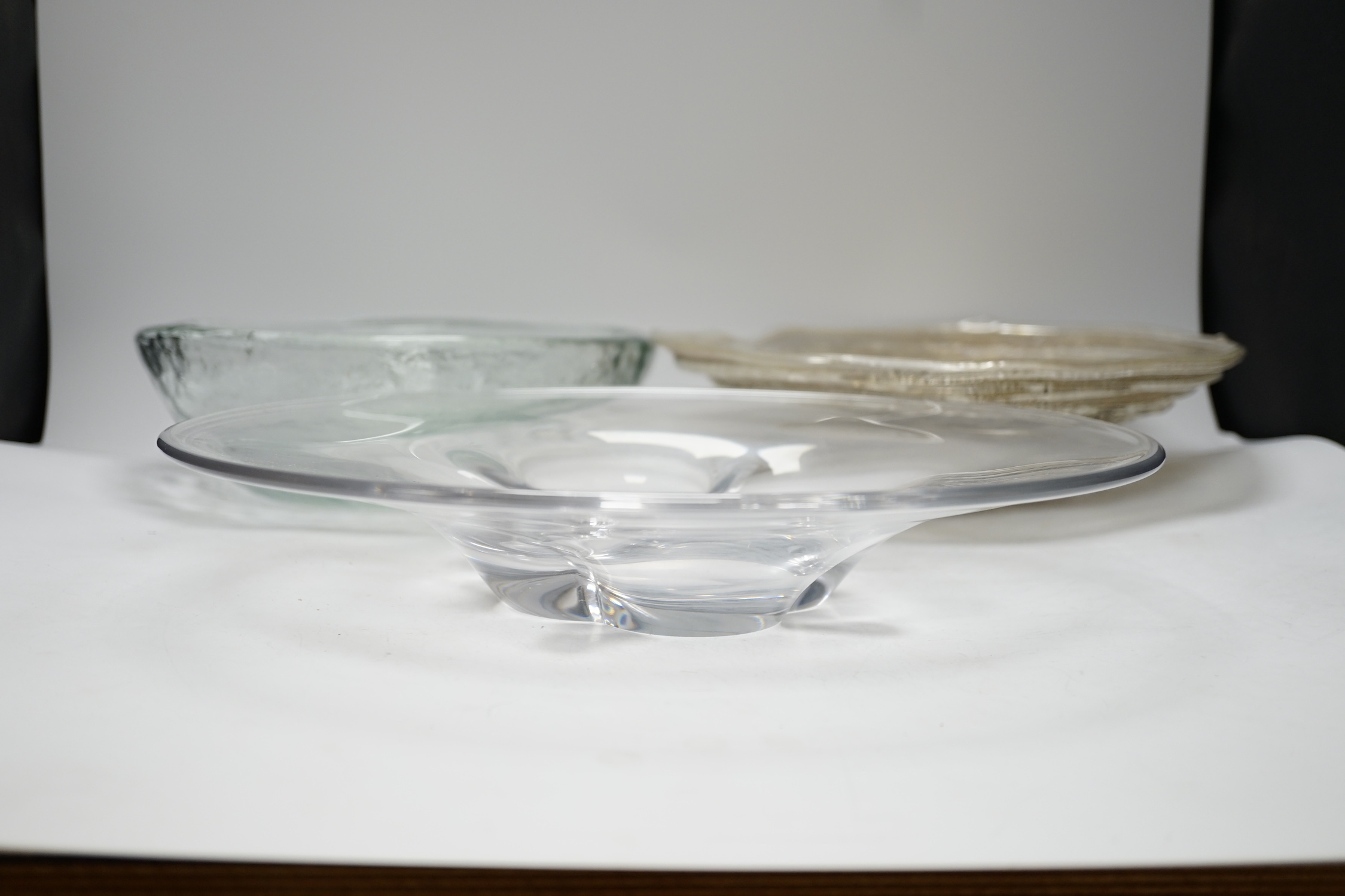 Three glass dishes, including one by Orrefors and one by A A Designs, largest 35cm in diameter